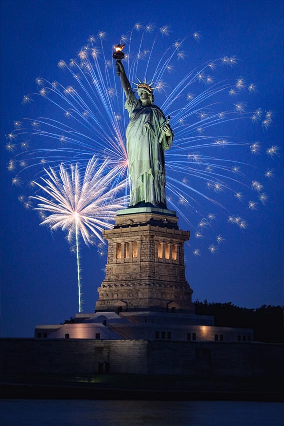 After Example of Fireworks Overlays - The Statue of Liberty with fireworks in the sky behind it